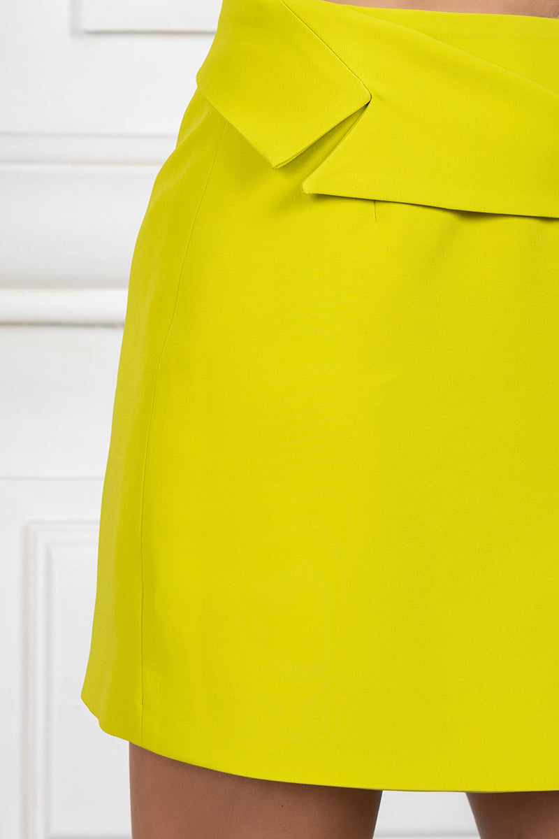 Asymmetric mini skirt in chartreuse